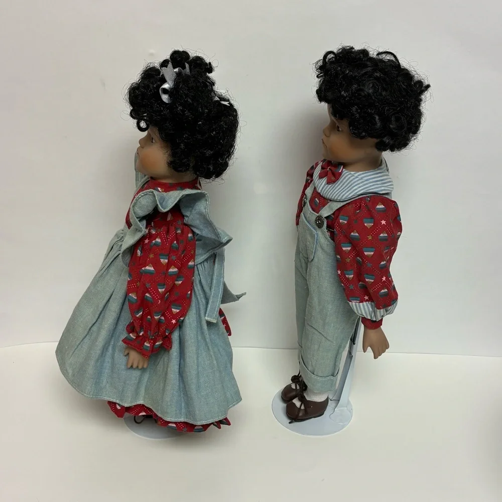 Delton Product Corp. Porcelain Brown Boy Girl Dolls Stands Matching Outfits